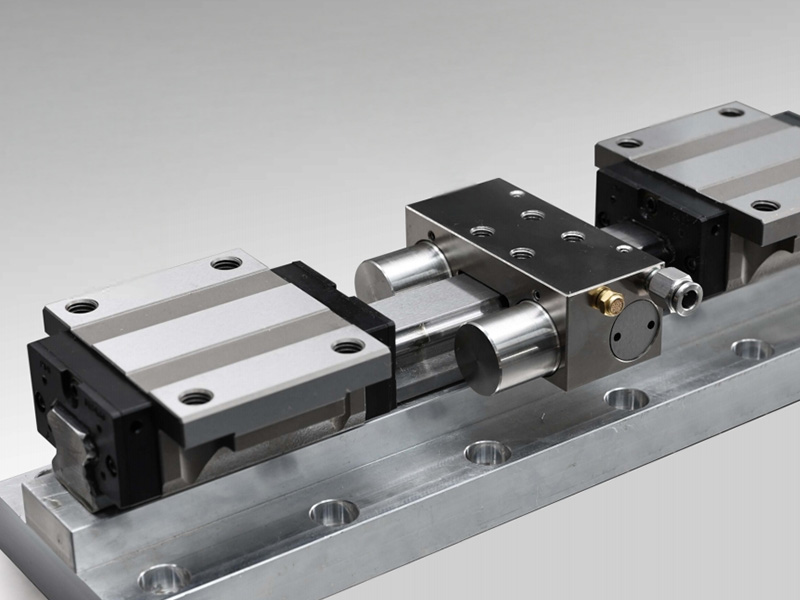 Linear guide rail clamps and brakes